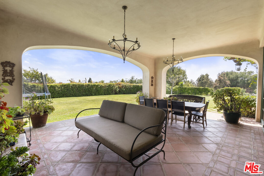 361 Fordyce Road Los Angeles, CA 90049 - Photo 36 of 40 a patio with yard a patio and a garden