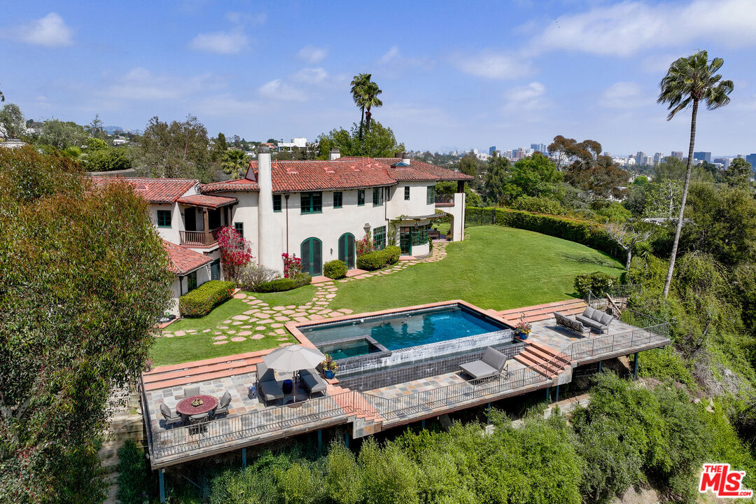 361 Fordyce Road Los Angeles, CA 90049 - Photo 37 of 40 an aerial view of a house with a garden
