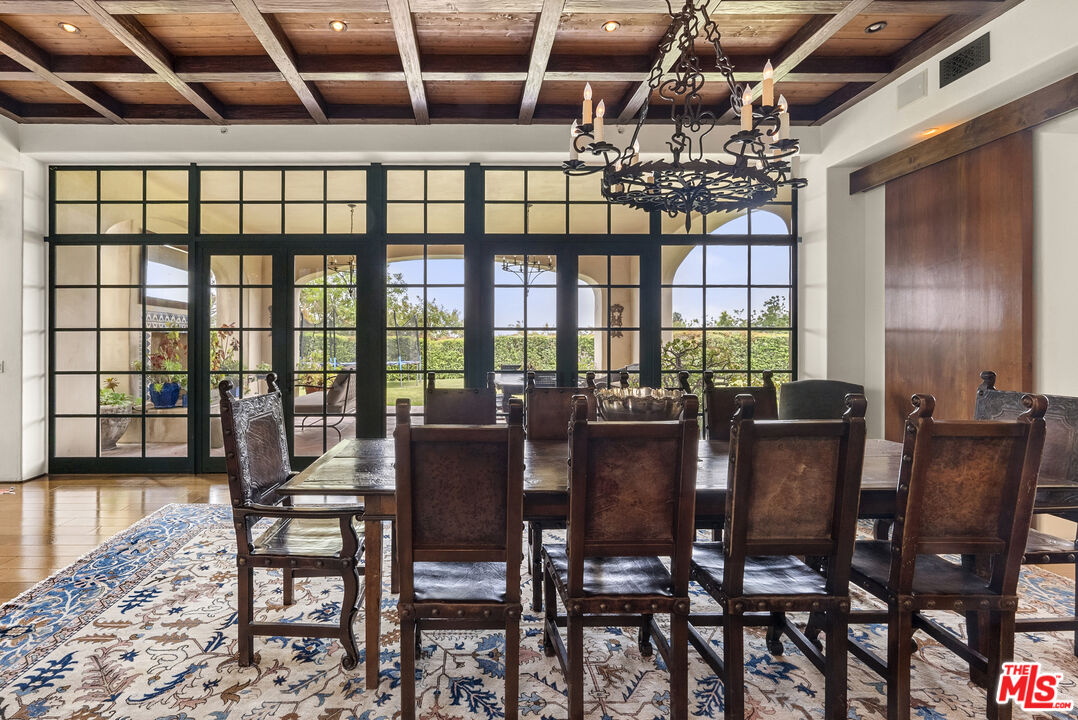 361 Fordyce Road Los Angeles, CA 90049 - Photo 9 of 40 a view of a dining room with furniture window and outside view