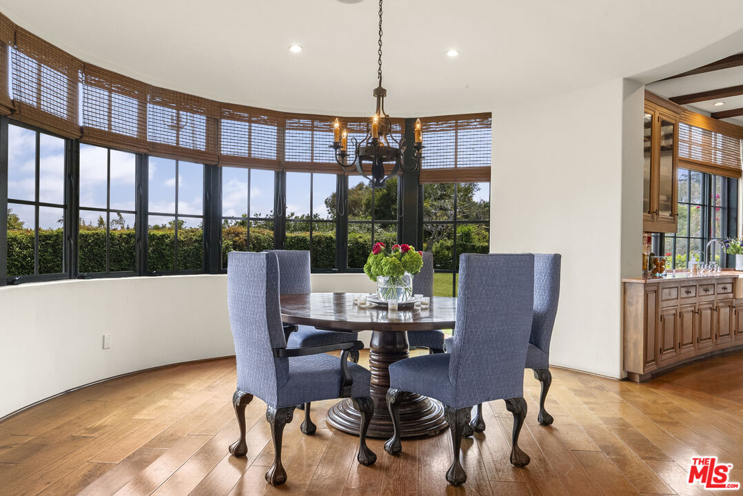 361 Fordyce Road Los Angeles, CA 90049 - Photo 10 of 40 a view of a dining room with furniture window and outside view