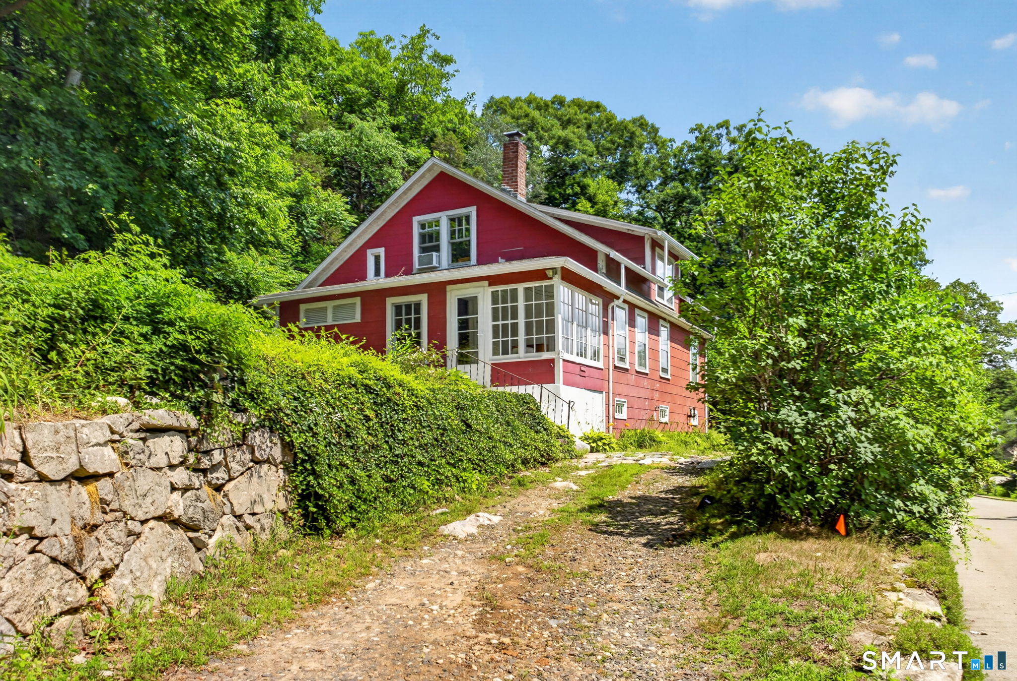 79 River Street Deep River, CT 06417 - Photo 2 of 40 a view of a house with a yard and garden