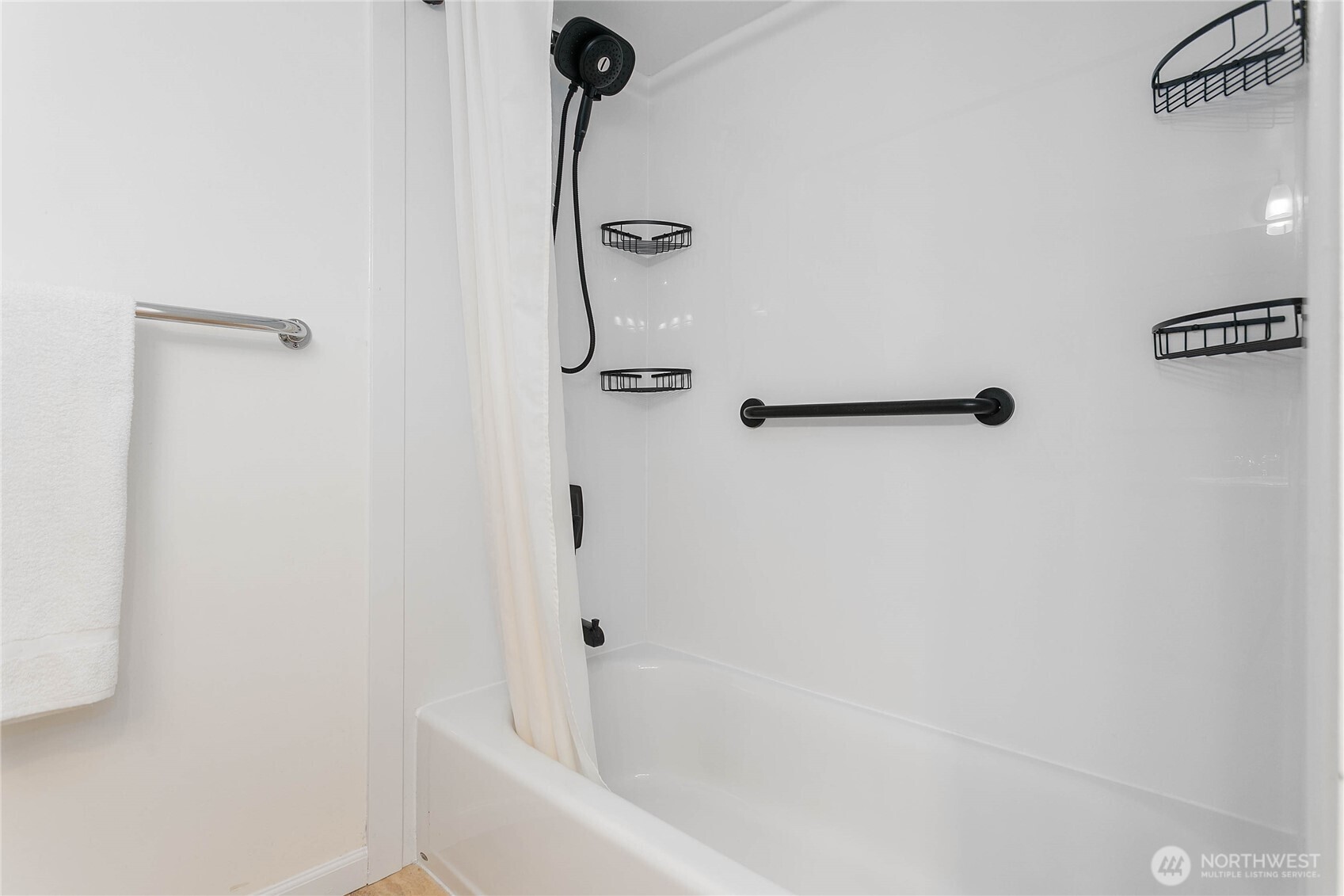 1014 11th Street, Unit 302 Bellingham, WA 98225 - Photo 16 of 30 a bathroom with a bathtub