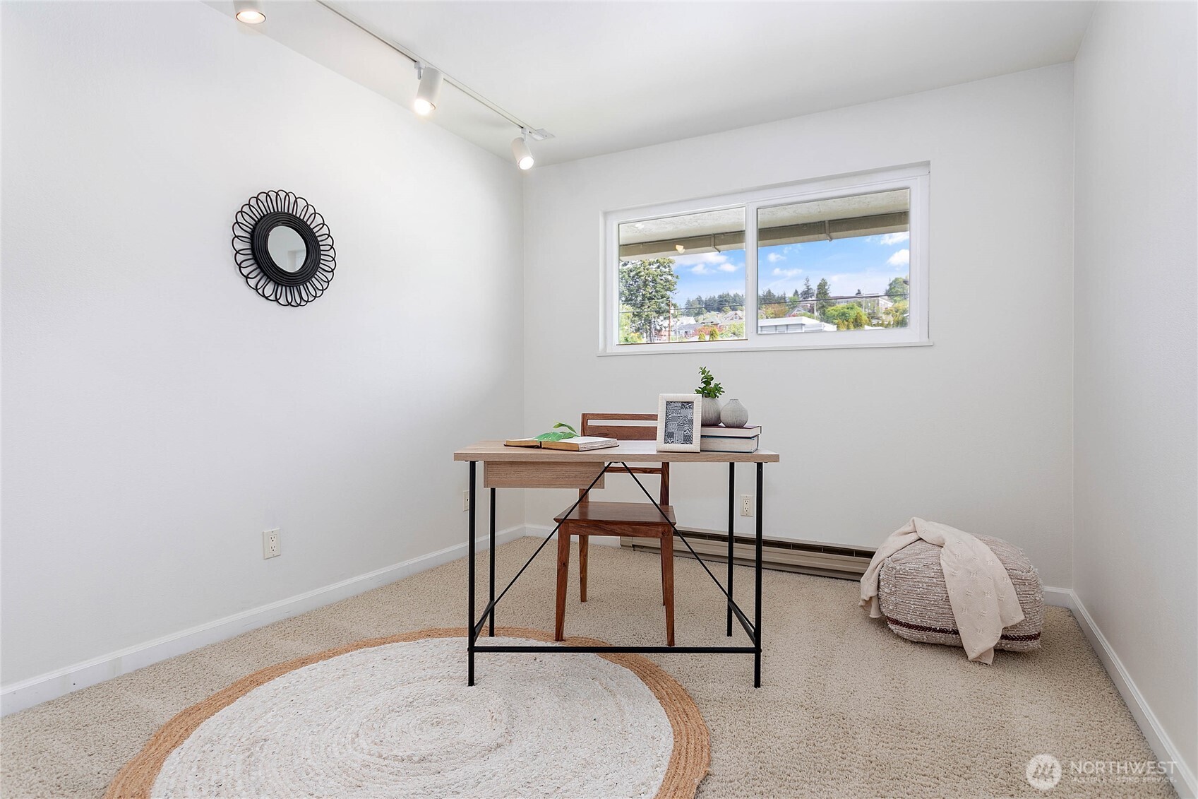 1014 11th Street, Unit 302 Bellingham, WA 98225 - Photo 17 of 30 a workspace with furniture and window