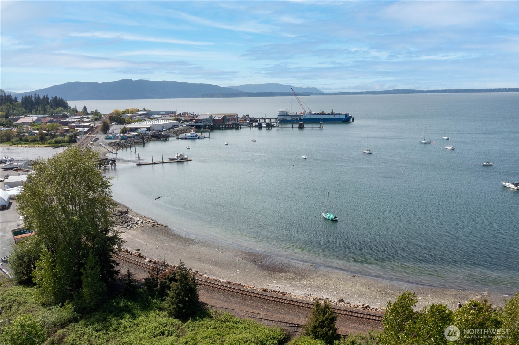 1014 11th Street, Unit 302 Bellingham, WA 98225 - Photo 23 of 30 a view of a lake and a mountain