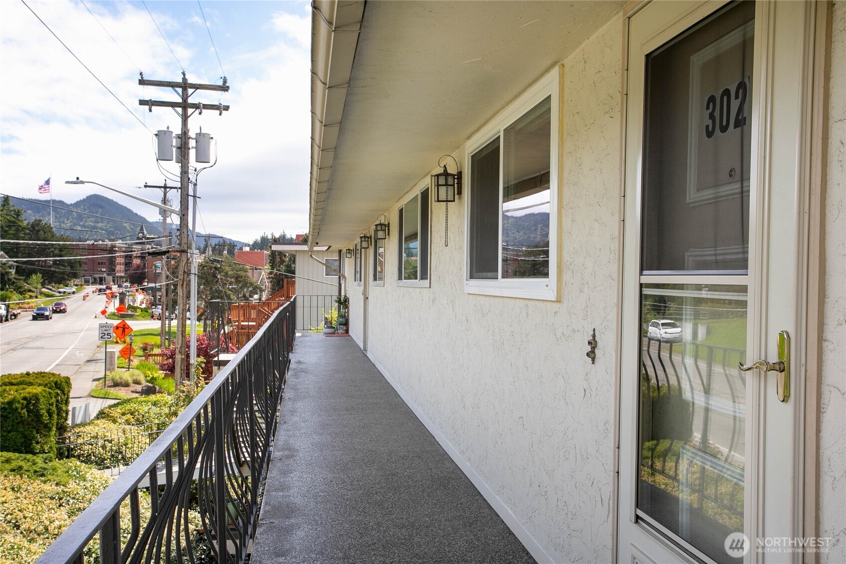 1014 11th Street, Unit 302 Bellingham, WA 98225 - Photo 5 of 30 a balcony with wooden floor