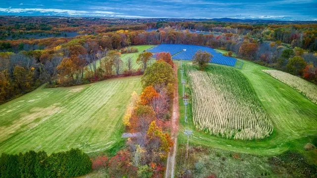 a view of a swimming pool and a yard