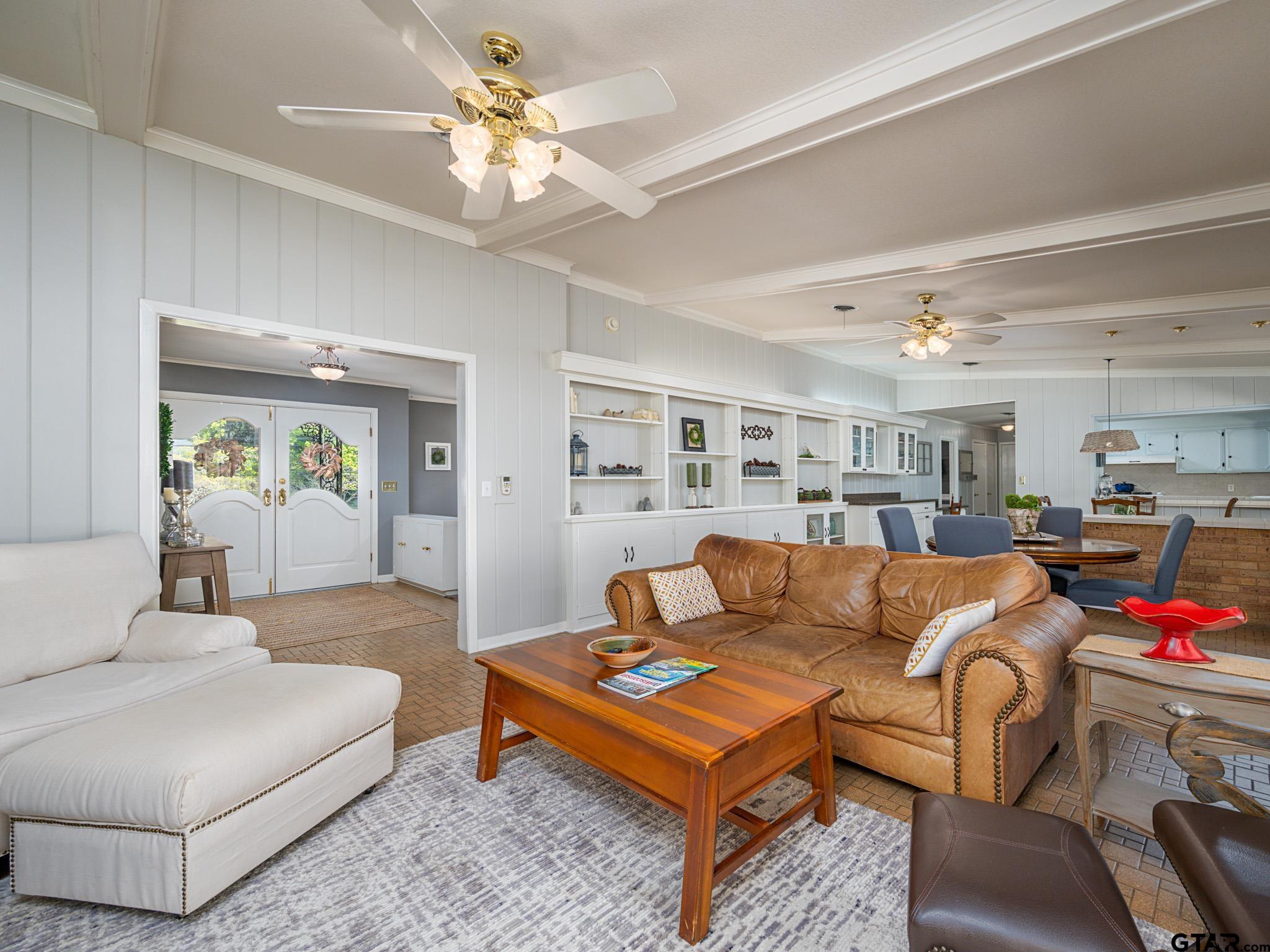 3203 Dinah Lane Tyler, TX 75701 - Photo 13 of 33 a living room with furniture and a chandelier