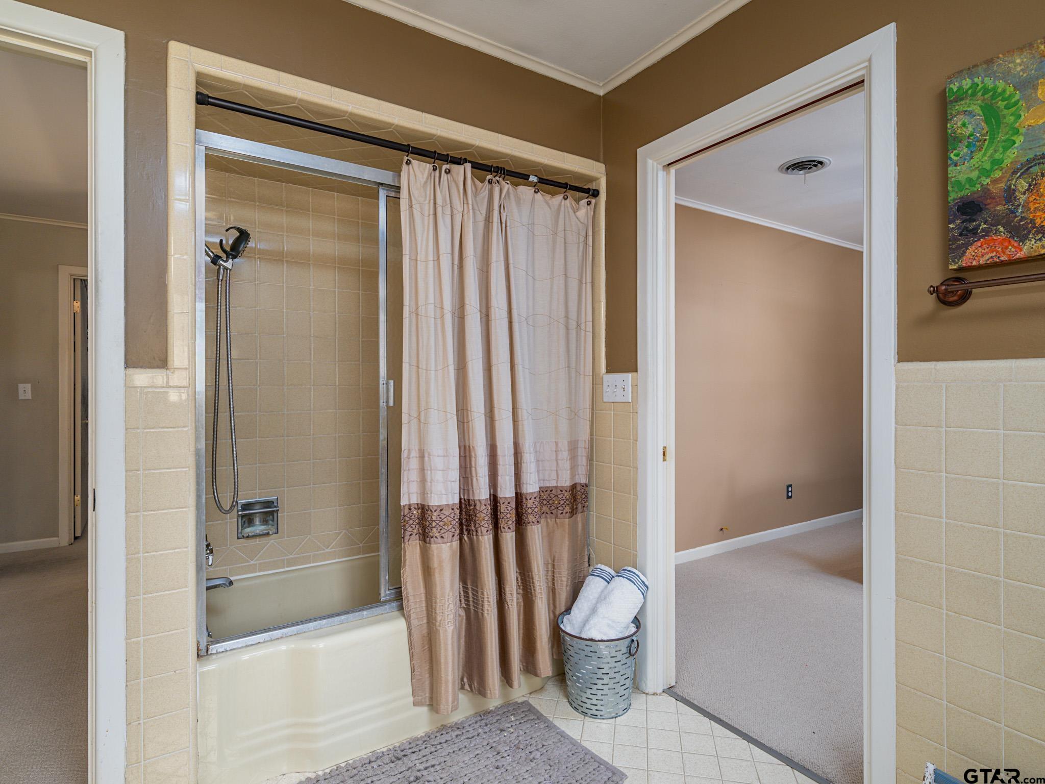 3203 Dinah Lane Tyler, TX 75701 - Photo 24 of 33 a bathroom with a shower and a toilet