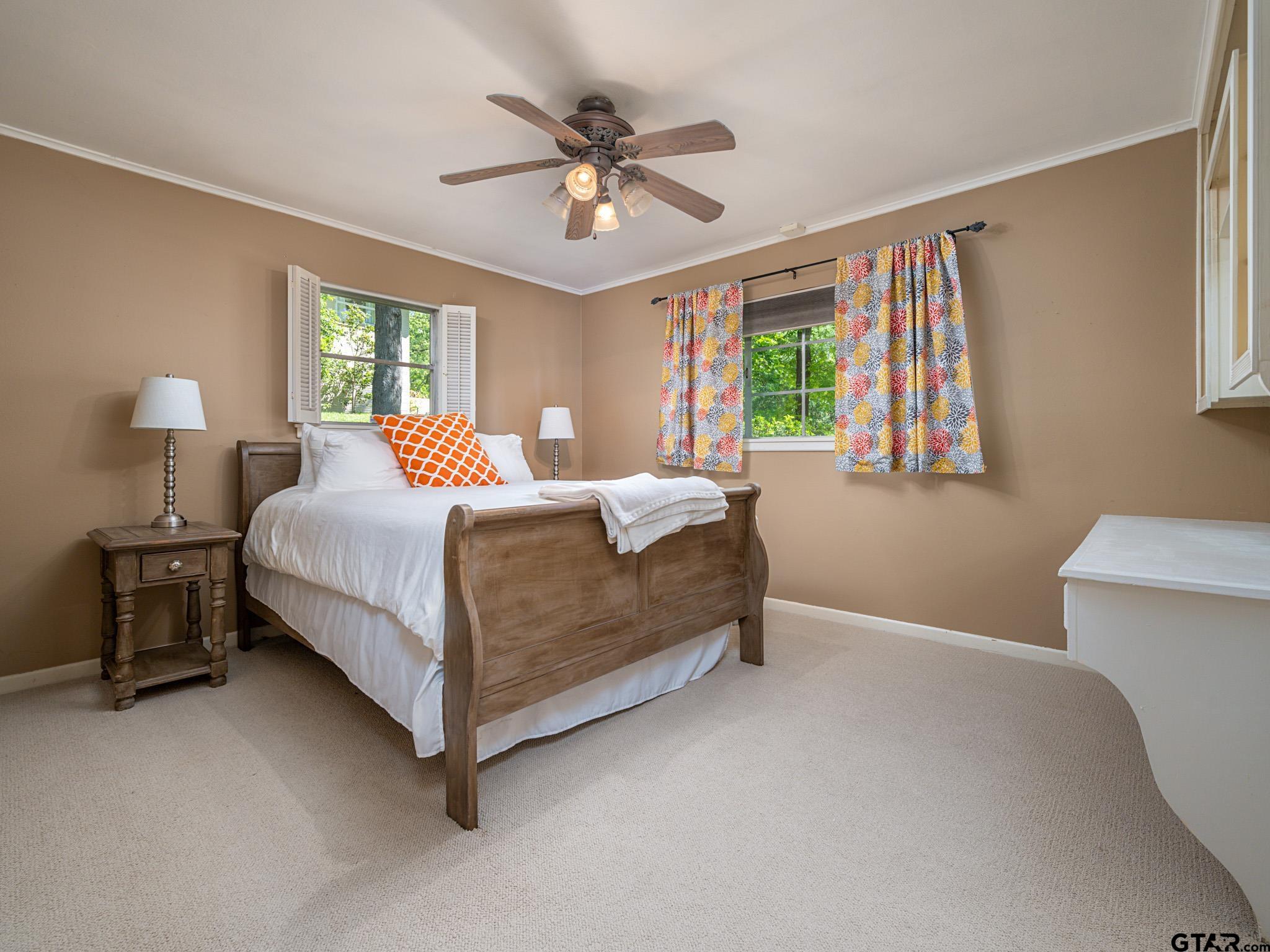 3203 Dinah Lane Tyler, TX 75701 - Photo 25 of 33 a bedroom with a bed and window