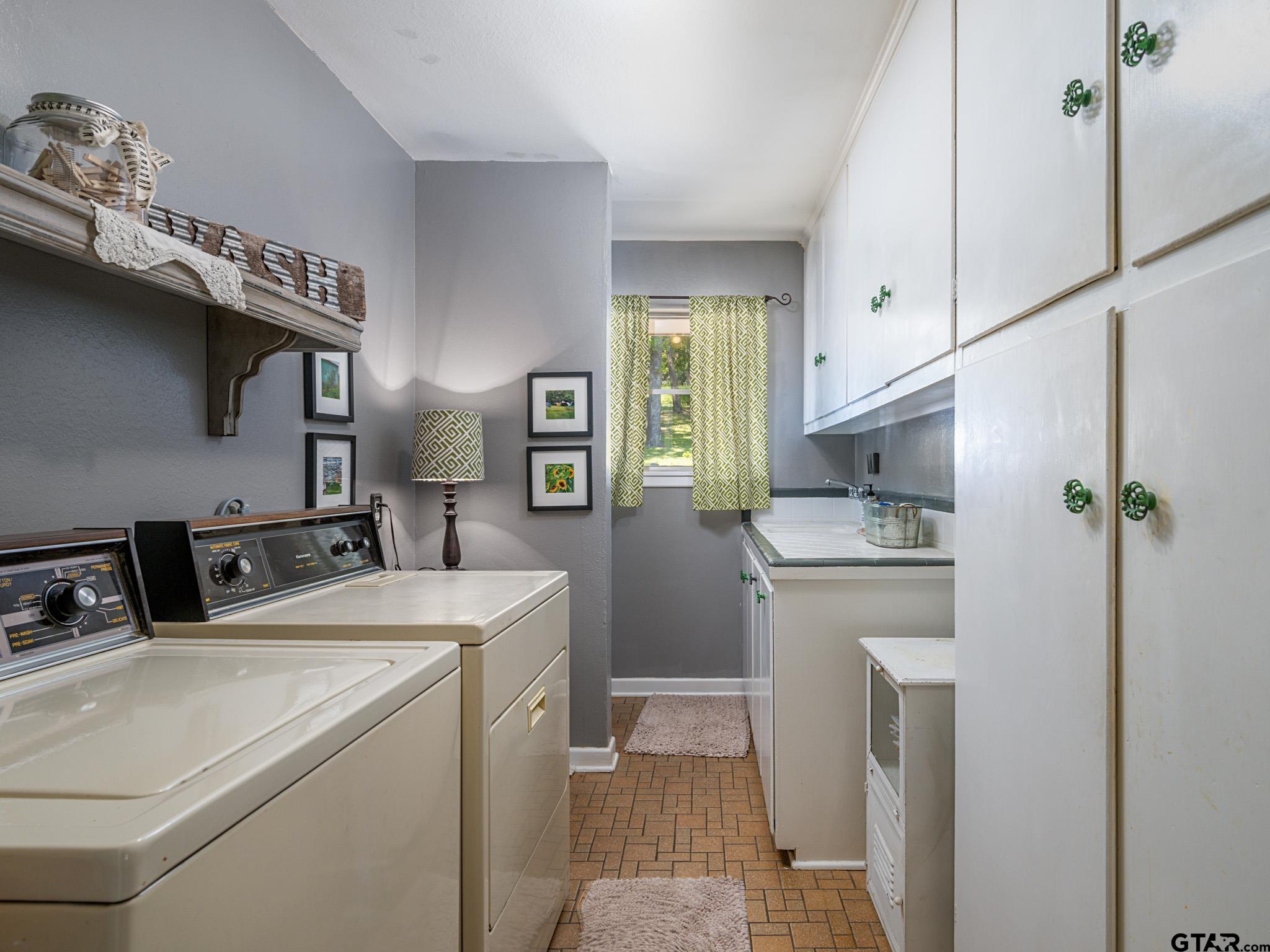 3203 Dinah Lane Tyler, TX 75701 - Photo 27 of 33 a room with storage and utility