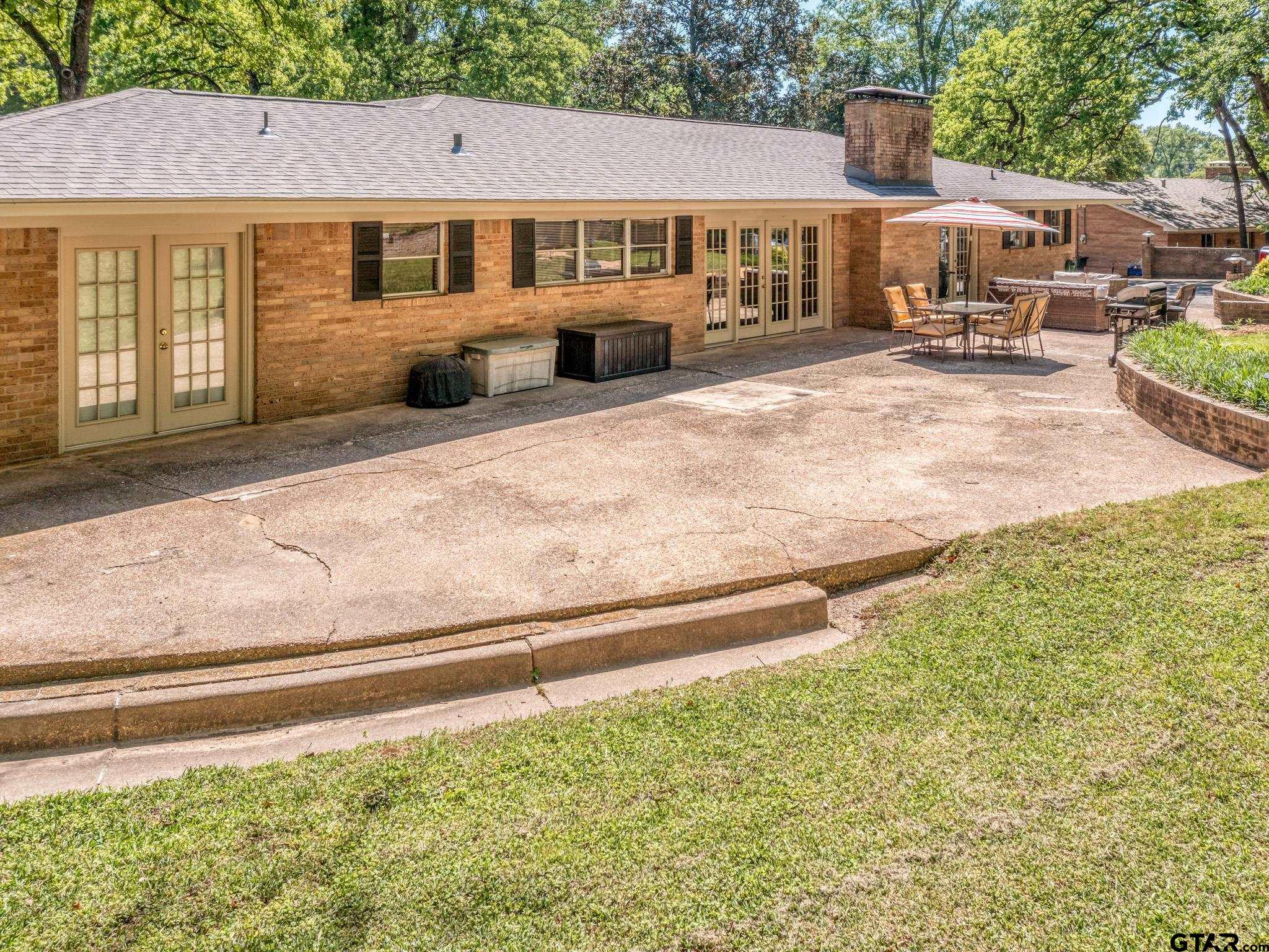 3203 Dinah Lane Tyler, TX 75701 - Photo 30 of 33 a front view of a house with a yard