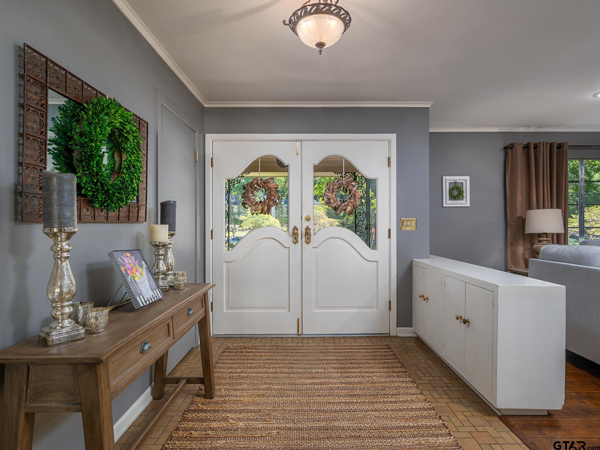 3203 Dinah Lane Tyler, TX 75701 - Photo 3 of 33 a living room with furniture and windows