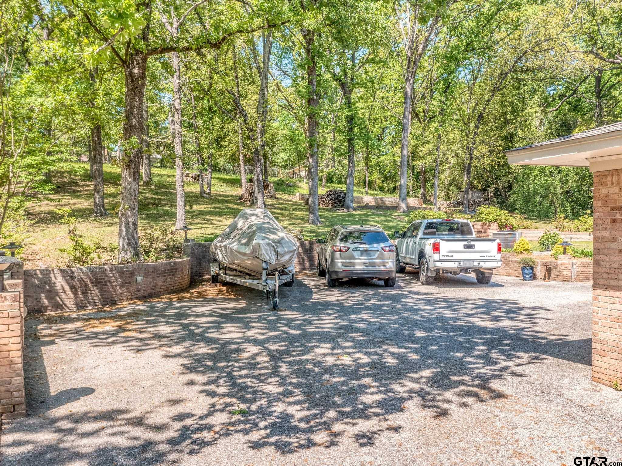 3203 Dinah Lane Tyler, TX 75701 - Photo 32 of 33 a view of yard with car parked