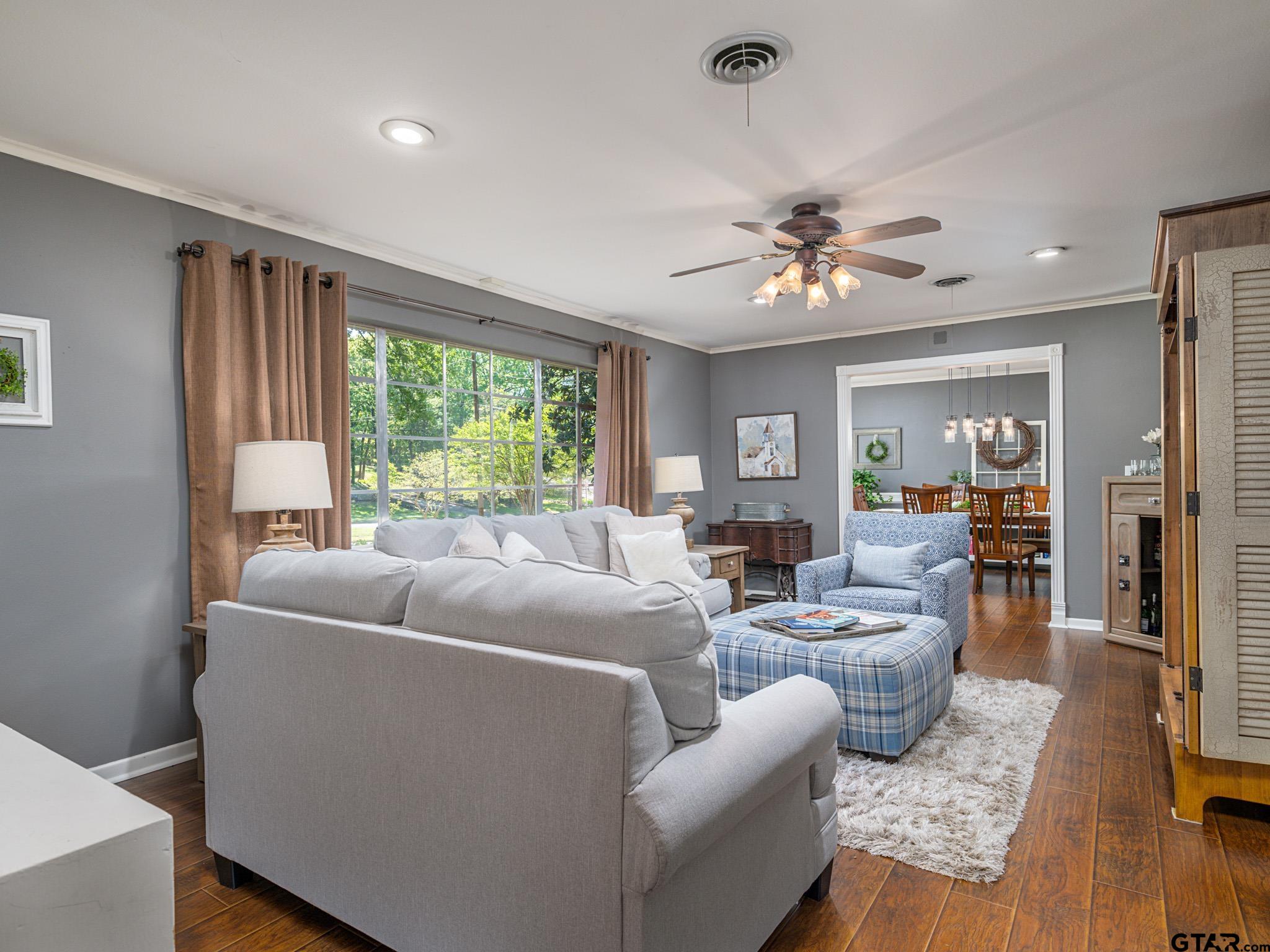 3203 Dinah Lane Tyler, TX 75701 - Photo 4 of 33 a living room with furniture and a large window