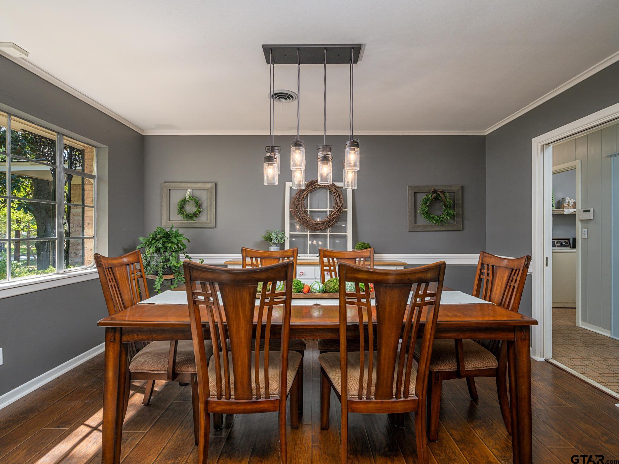 3203 Dinah Lane Tyler, TX 75701 - Photo 6 of 33 a view of a dining room with furniture window and wooden floor