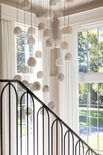 a view of a patio with couches chairs and a fire pit