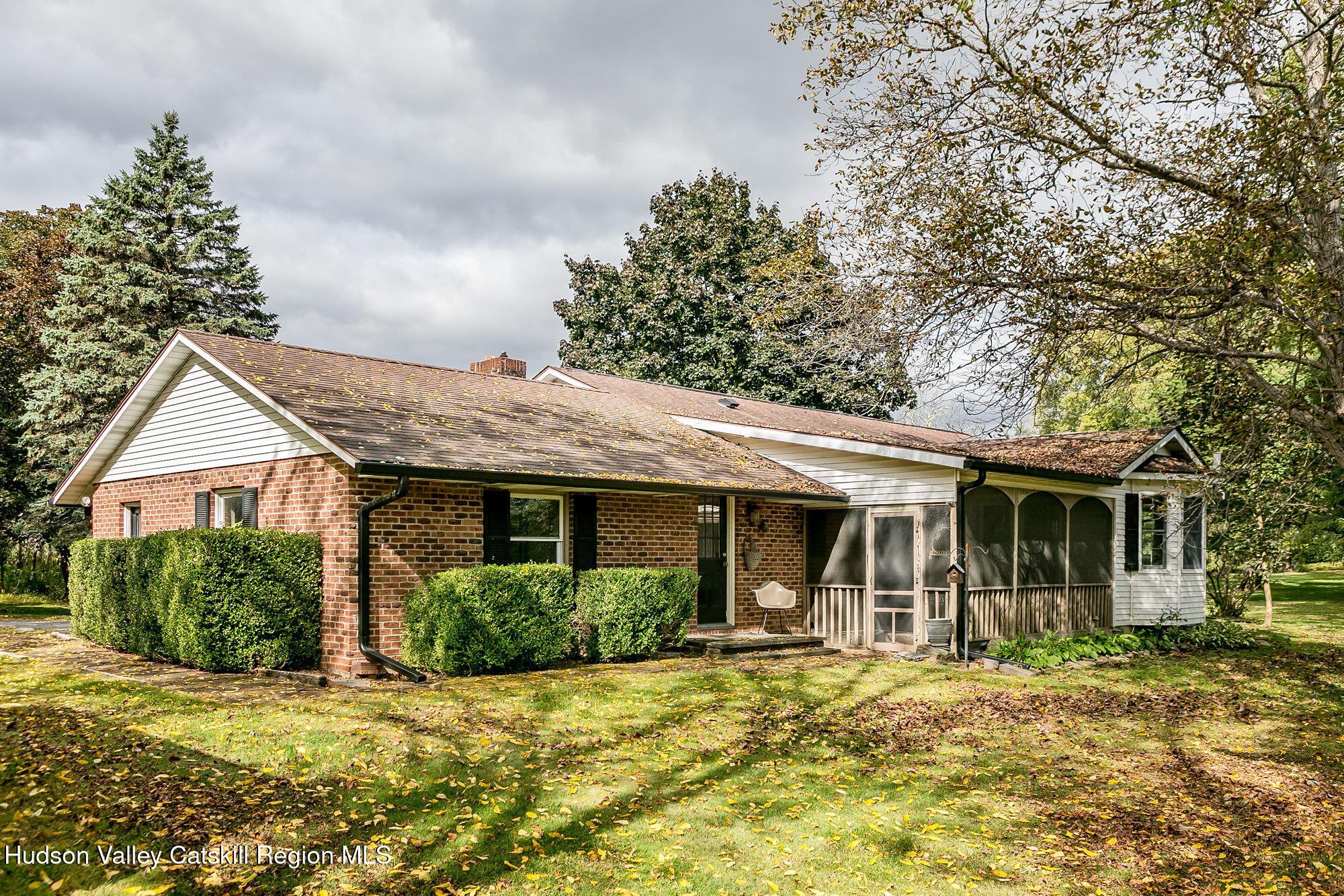 1234 Flatbush Road Kingston, NY 12401 - Photo 2 of 28 a front view of a house with a patio
