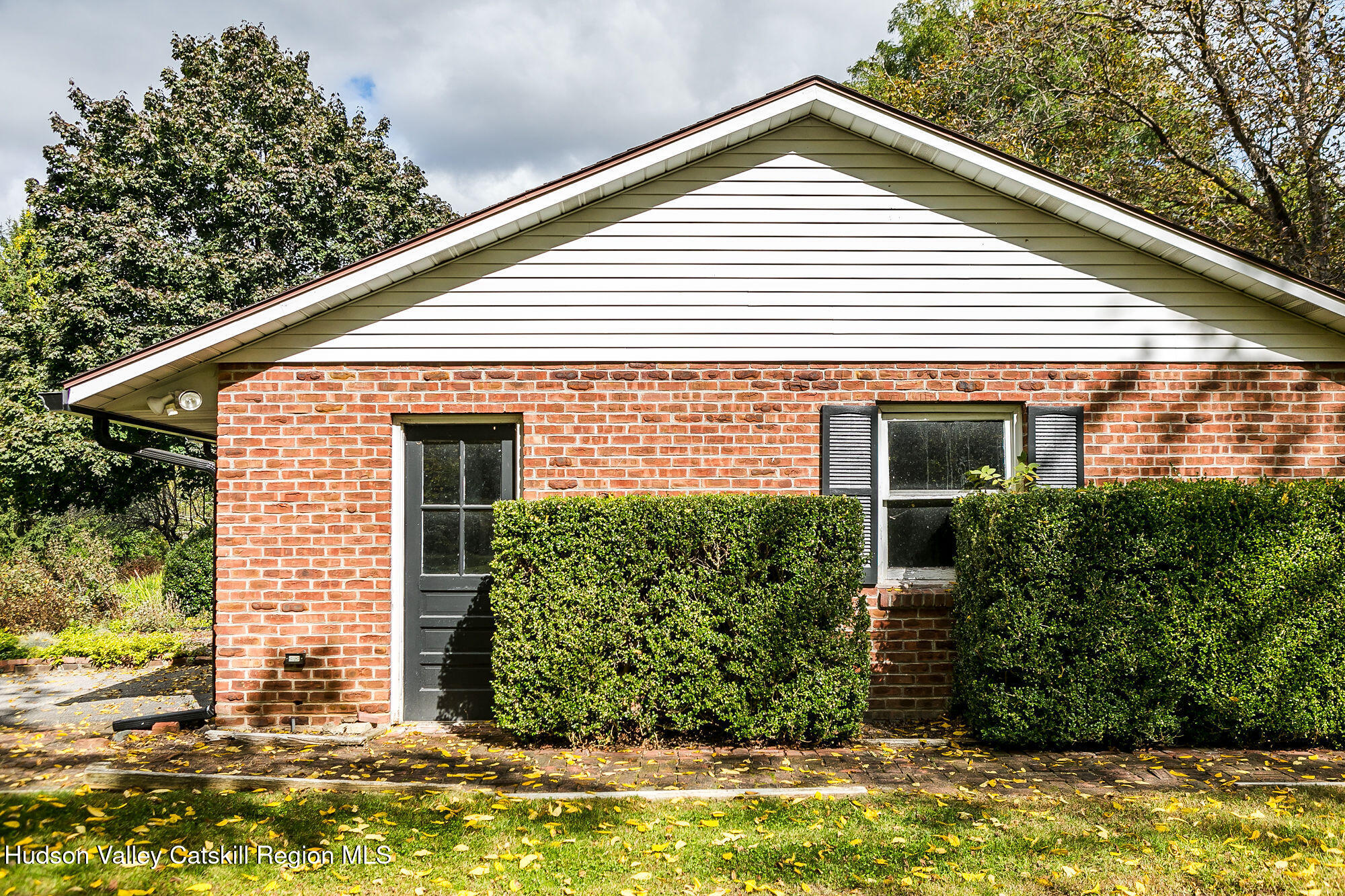 1234 Flatbush Road Kingston, NY 12401 - Photo 3 of 28 a view of a white house next to a yard with potted plants