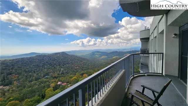 a view of balcony and wooden floor