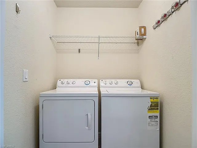 a view of a brick wall with windows