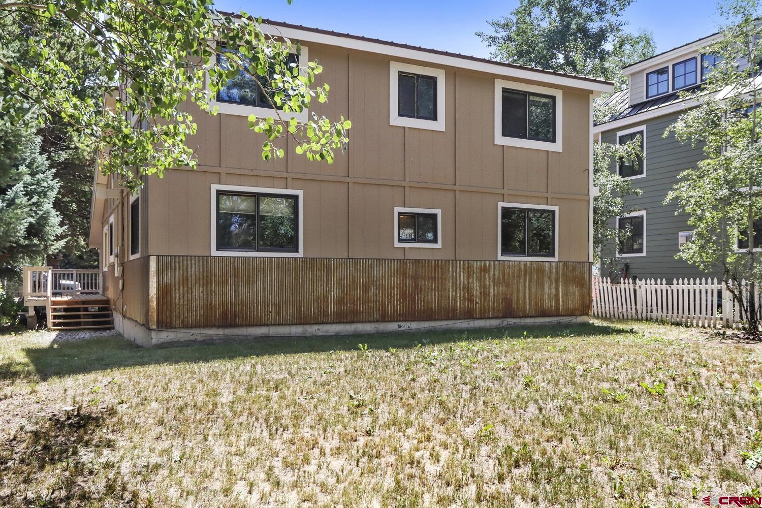 721 Whiterock Avenue Crested Butte, CO 81224 - Photo 5 of 21 a view of front a house with a yard