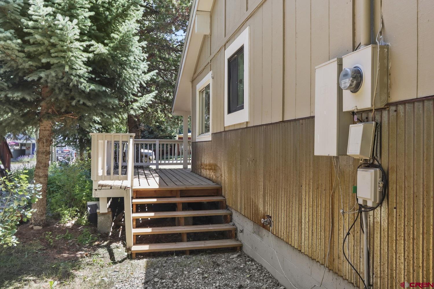721 Whiterock Avenue Crested Butte, CO 81224 - Photo 6 of 21 a view of a house with backyard and deck