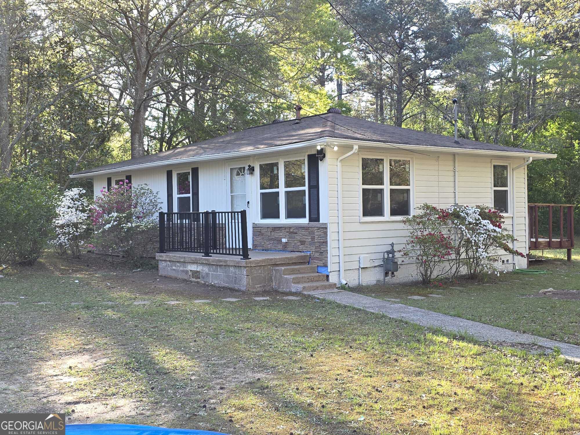 15 Dixie Drive Stockbridge, GA 30281 - Photo 3 of 36 a view of a house with a yard
