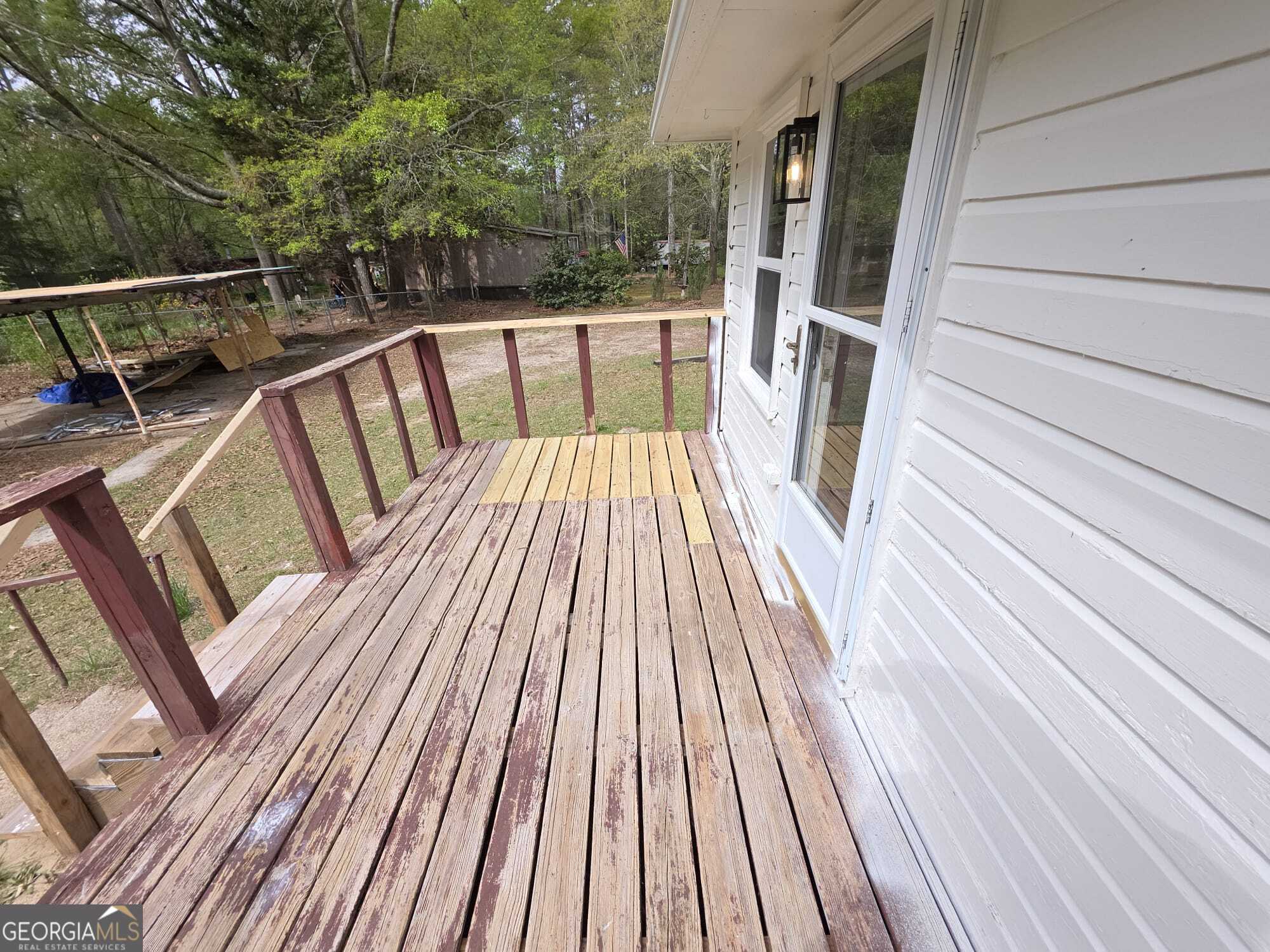 15 Dixie Drive Stockbridge, GA 30281 - Photo 36 of 36 a view of balcony with wooden floor and outdoor space