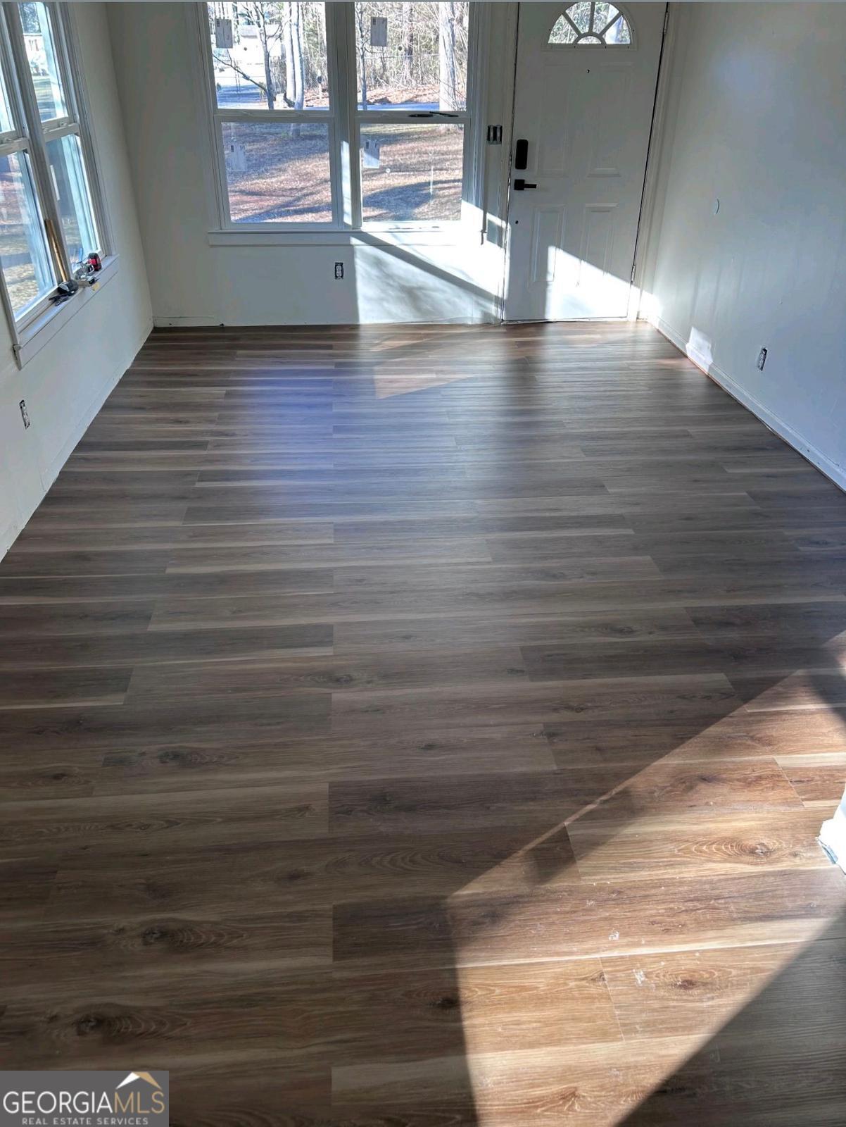 15 Dixie Drive Stockbridge, GA 30281 - Photo 5 of 19 a view of empty room with wooden floor