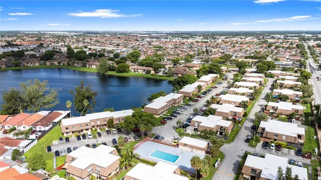 an aerial view of a house with outdoor space