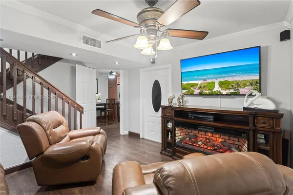 a bedroom with furniture and a fireplace