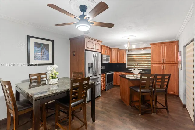 a view of a dining room with furniture