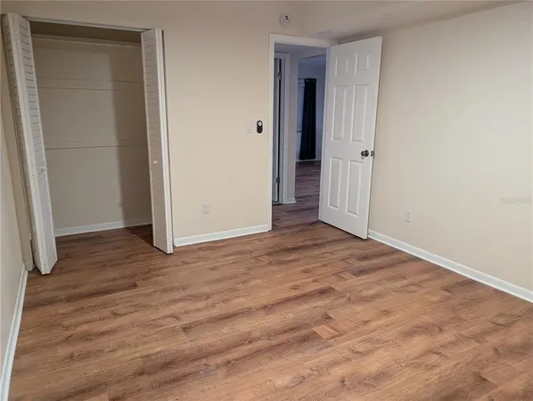 an empty room with closet