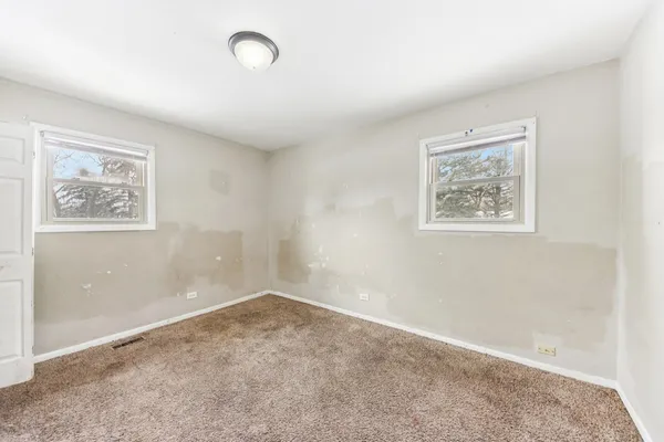 an empty room with a window