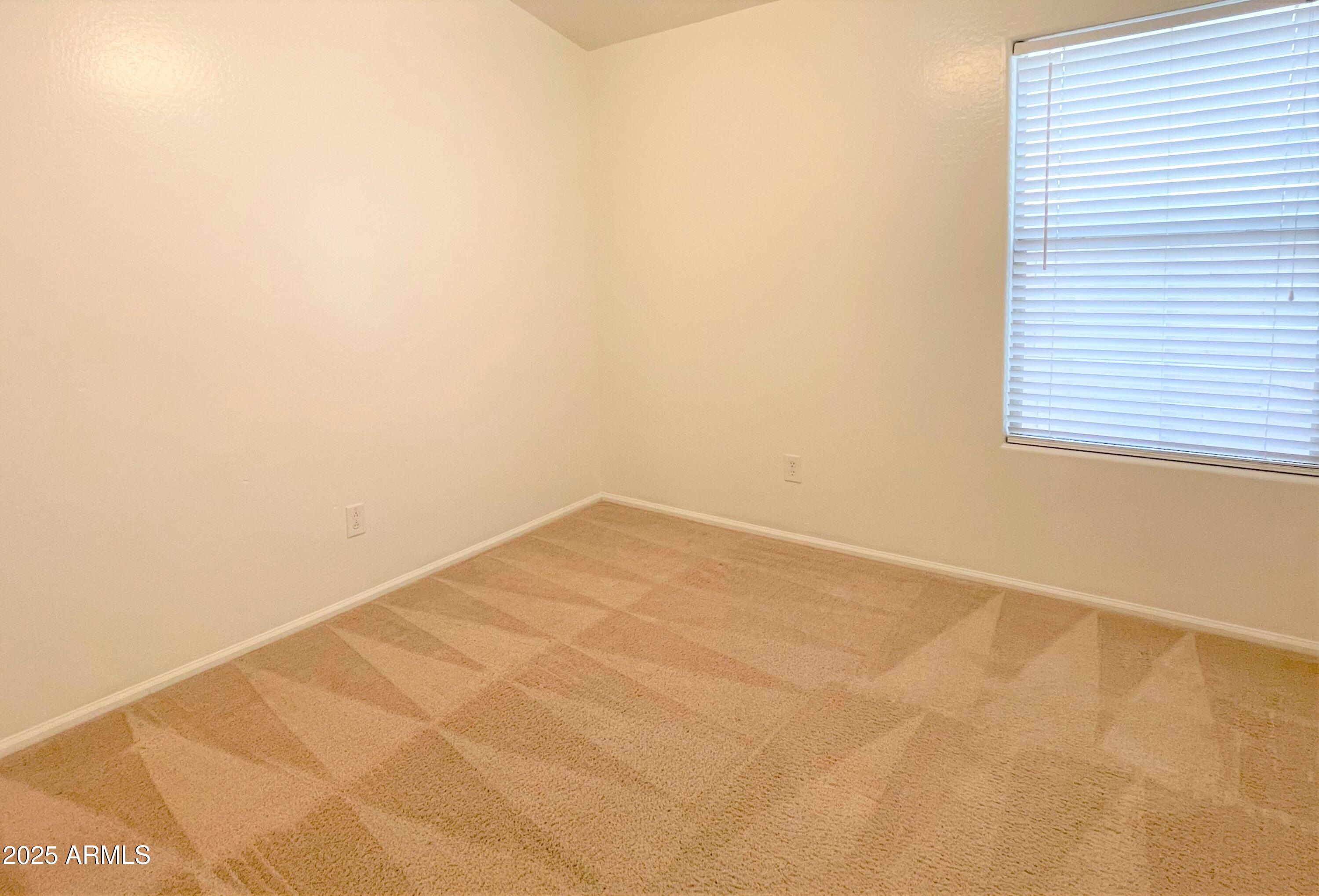 3984 East Tanzanite Lane San Tan Valley, AZ 85143 - Photo 12 of 20 a view of an empty room