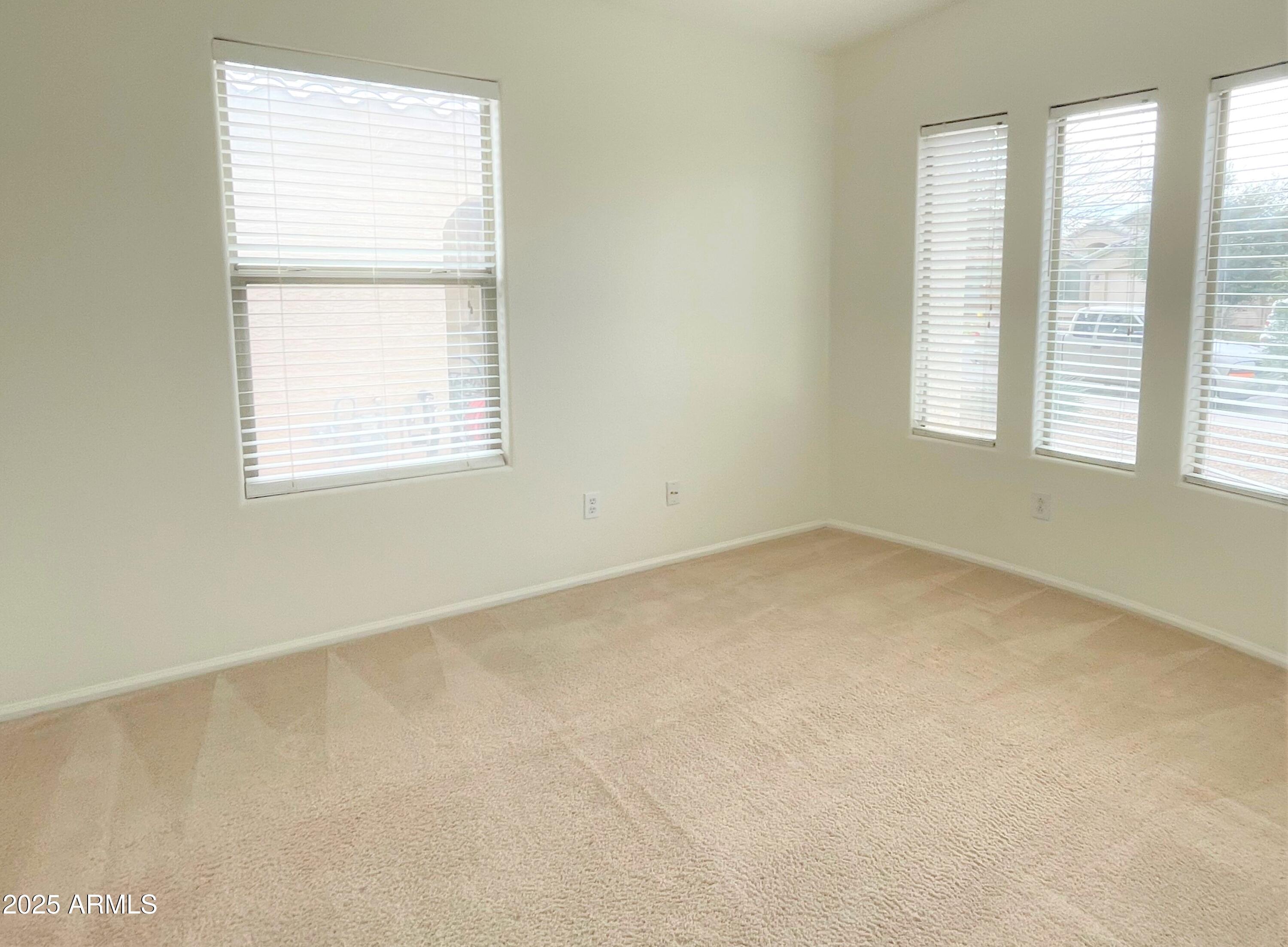 3984 East Tanzanite Lane San Tan Valley, AZ 85143 - Photo 14 of 20 an empty room with a window