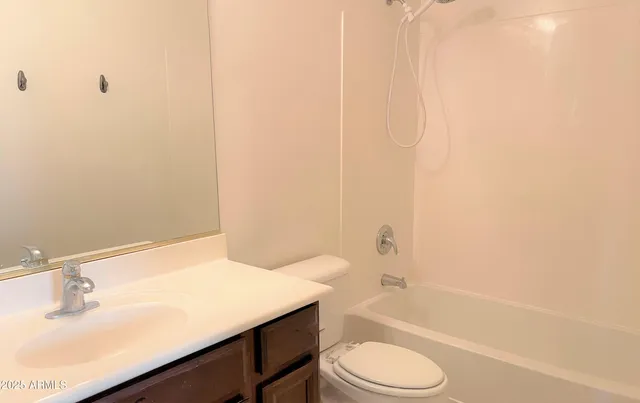 an empty room with closet area