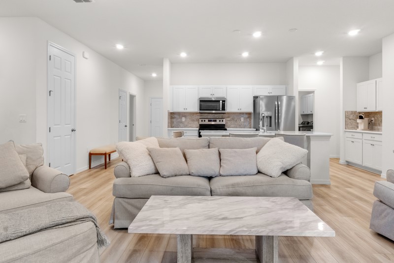1014 Guava Street Sebastian, FL 32958 - Photo 15 of 30 a living room with furniture and kitchen view