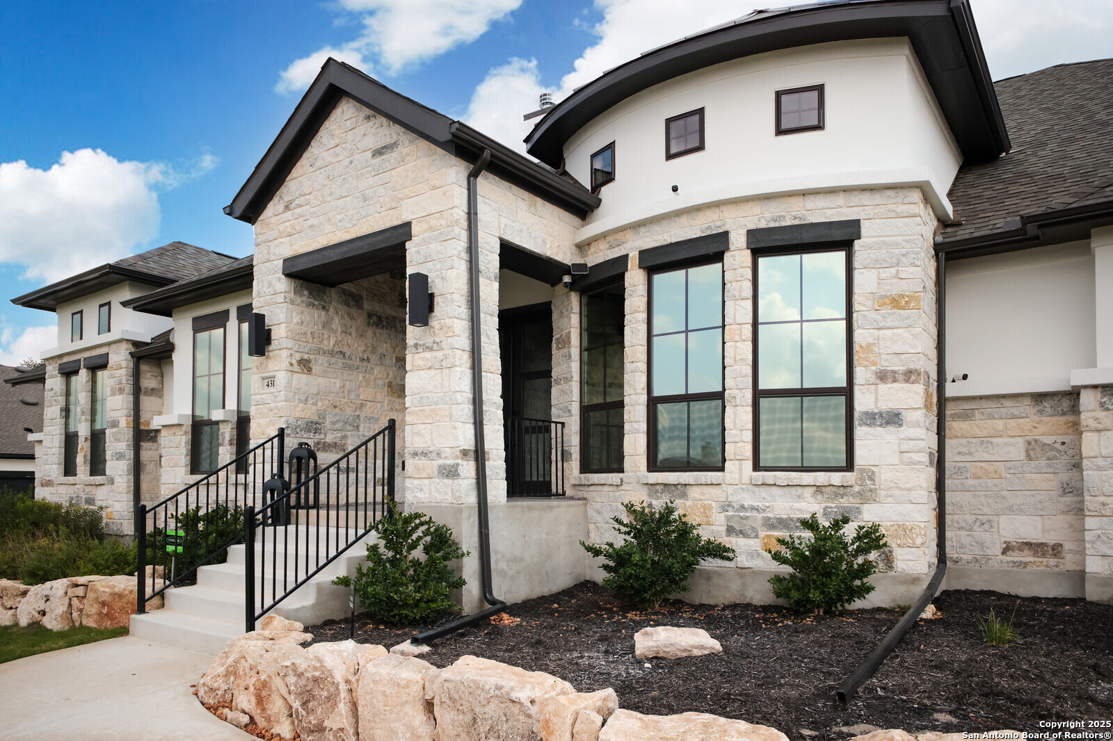 431 Falcon Cove Castroville, TX 78009 - Photo 2 of 46 a front view of a house with a yard