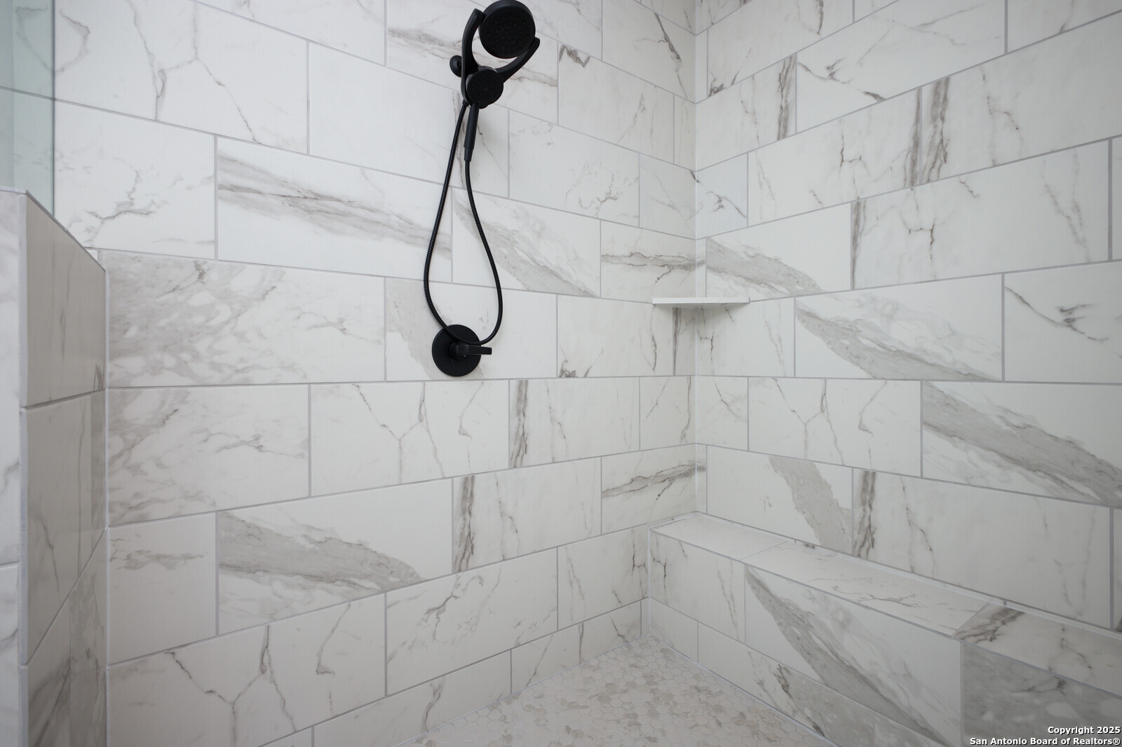 431 Falcon Cove Castroville, TX 78009 - Photo 21 of 46 a bathroom with a shower