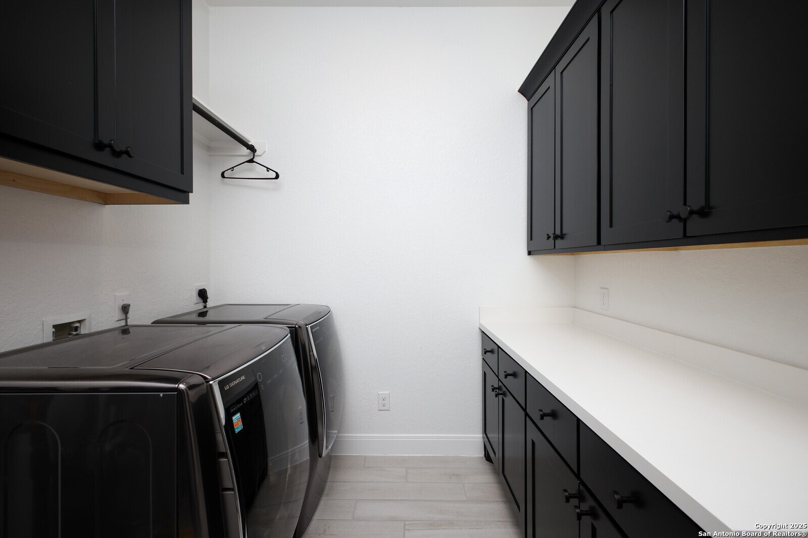 431 Falcon Cove Castroville, TX 78009 - Photo 31 of 46 a utility room with dryer and washer