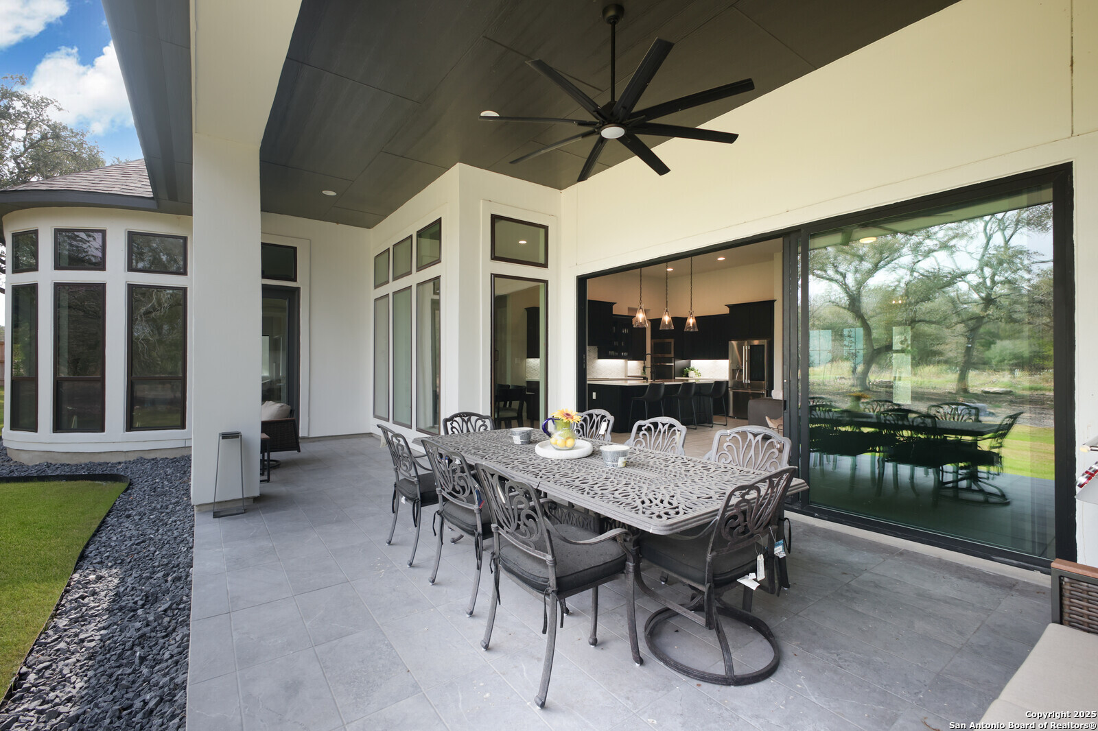 431 Falcon Cove Castroville, TX 78009 - Photo 33 of 46 a view of a patio with table and chairs