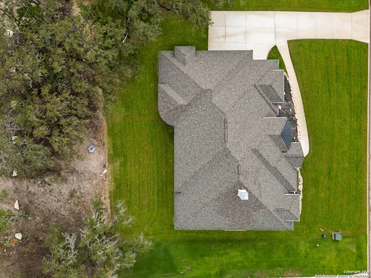 431 Falcon Cove Castroville, TX 78009 - Photo 41 of 46 an aerial view of a house with a yard