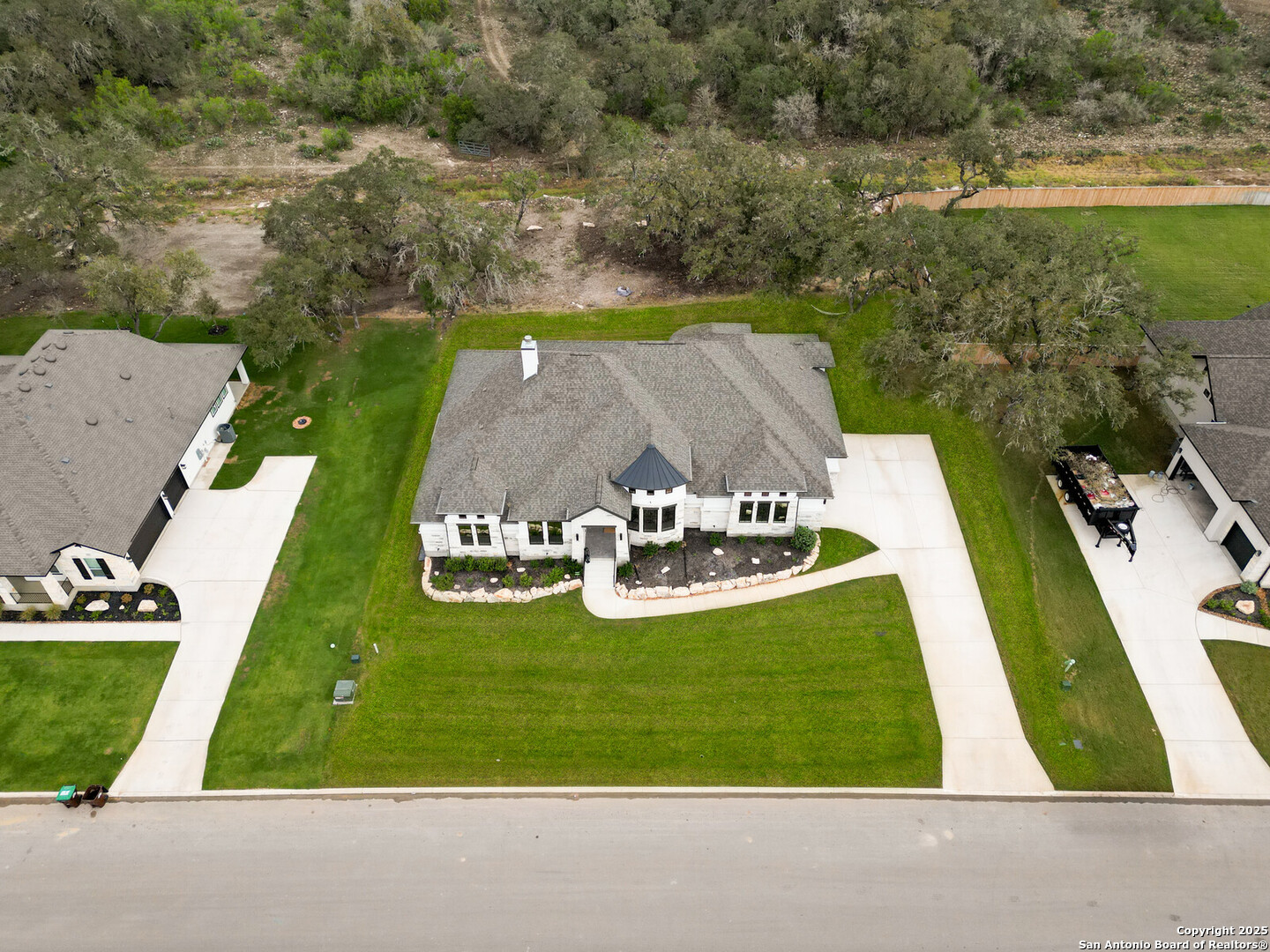 431 Falcon Cove Castroville, TX 78009 - Photo 42 of 46 an aerial view of a house with yard swimming pool and outdoor seating