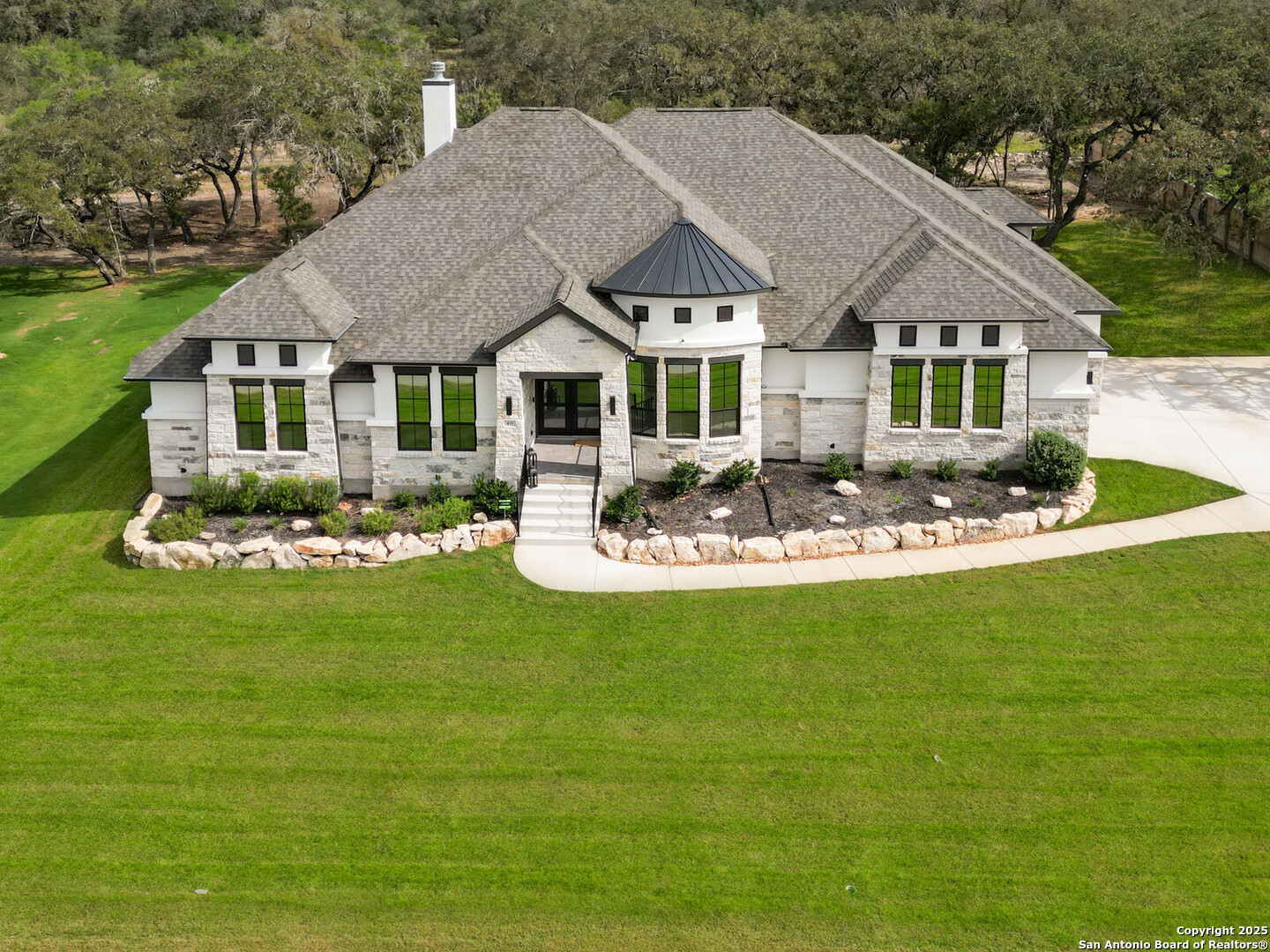 431 Falcon Cove Castroville, TX 78009 - Photo 45 of 46 a front view of a house with swimming pool and green space