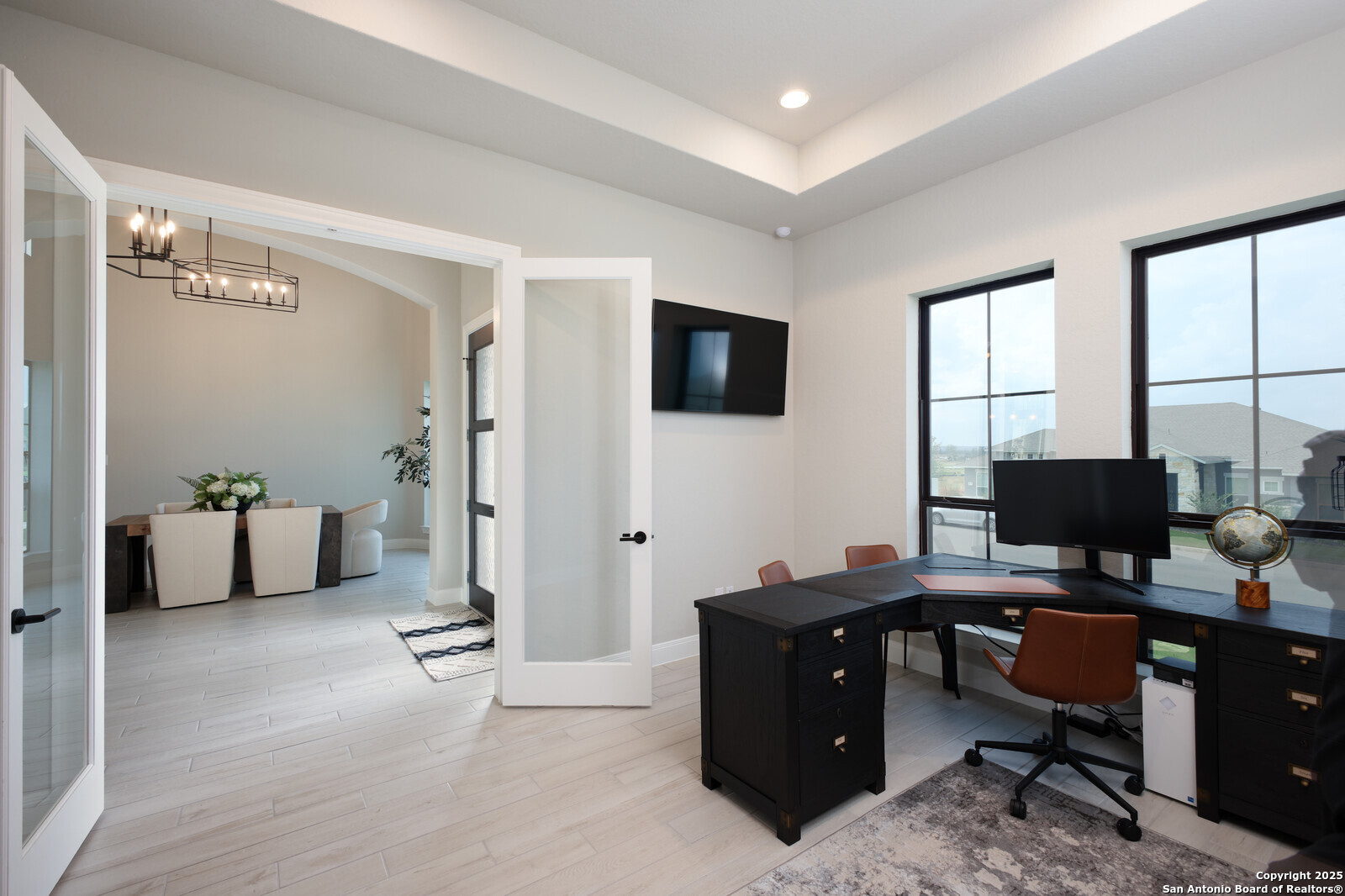 431 Falcon Cove Castroville, TX 78009 - Photo 5 of 46 a view of a livingroom with workspace and a window