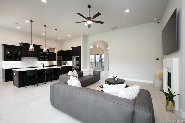 a kitchen with a table and chairs in it