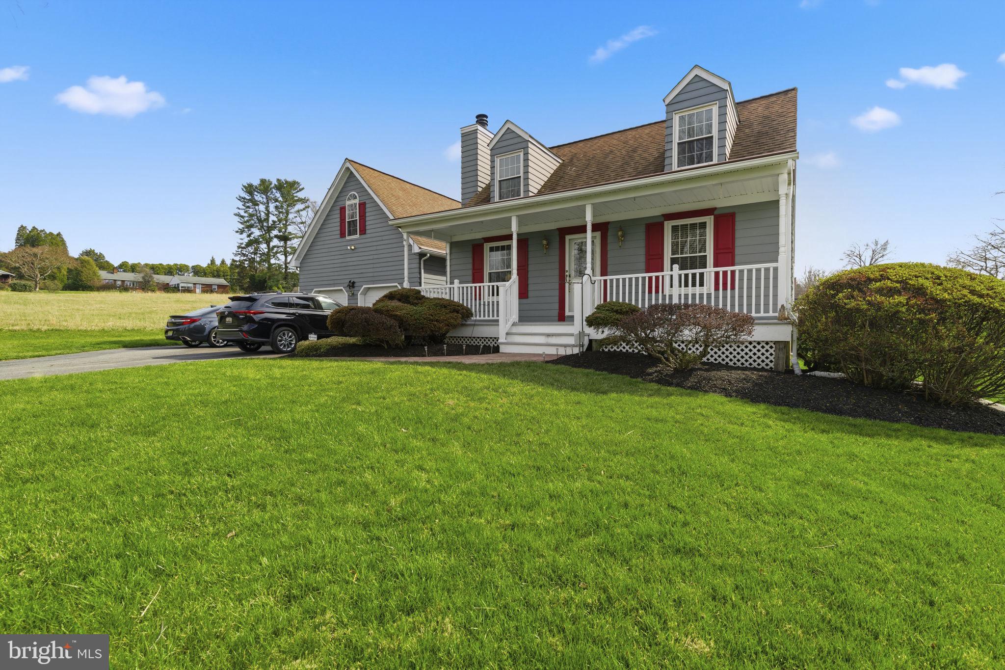3831 Wilkinson Road Havre de Grace, MD 21078 - Photo 41 of 51 a front view of a house with a garden and plants