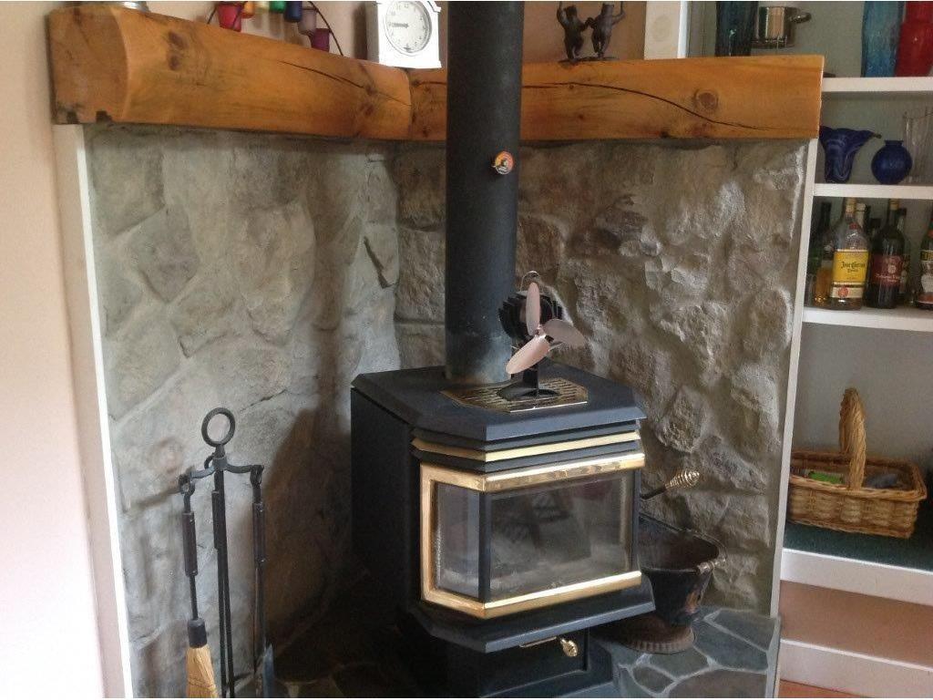 69 East Ridge Road Skowhegan, ME 04976 - Photo 10 of 35 Living room with heat stove