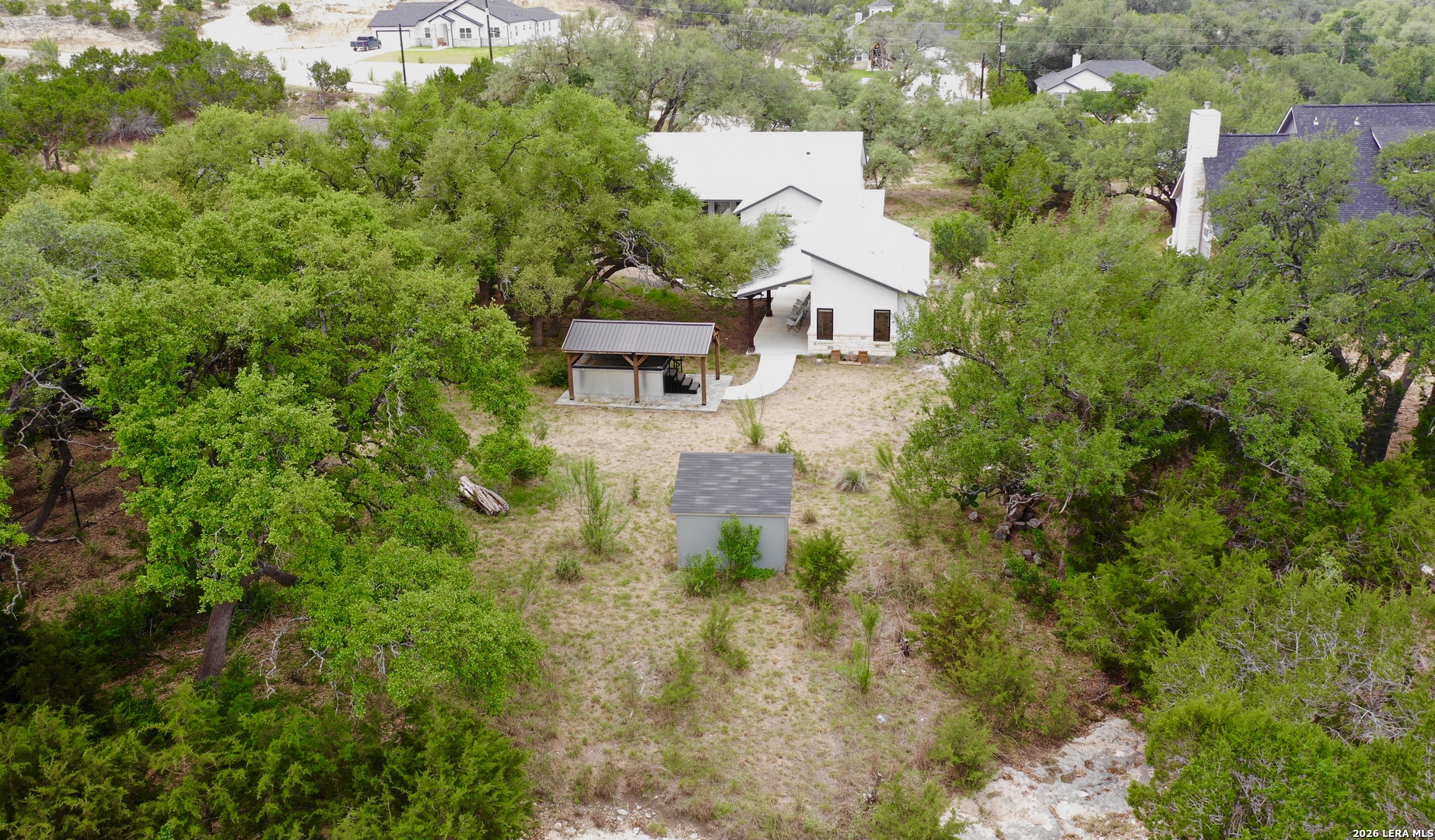 316 Prairie Tea Lane Spring Branch, TX 78070 - Photo 35 of 38 an aerial view of a house with a yard